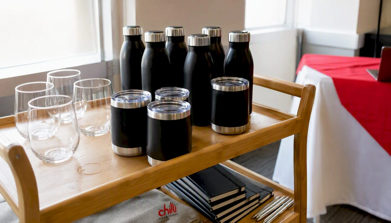 Branded reusable drinkware on event refreshment table