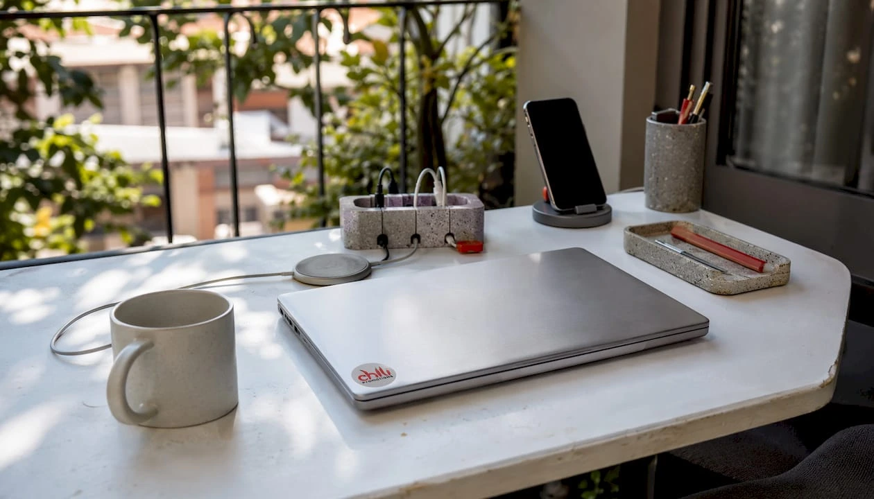 Wireless charging pad and wire organizer
