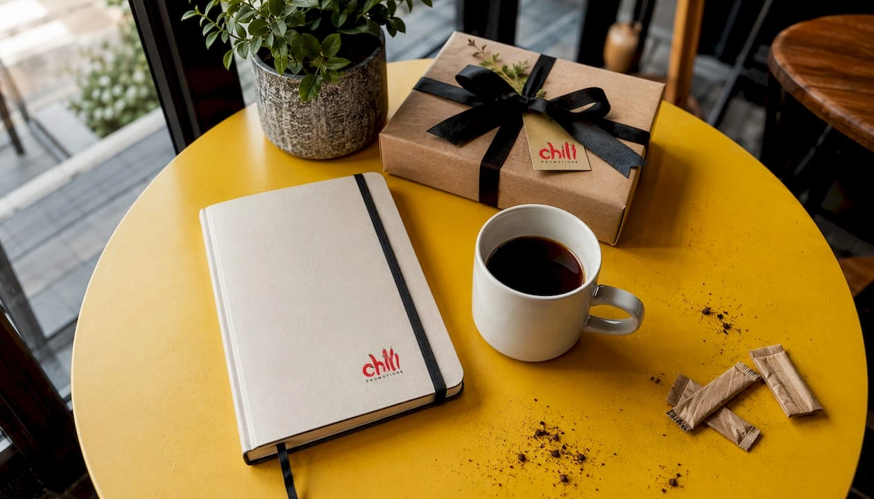 Branded gifts arranged on corporate table